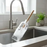 Cleaning a reusable water bottle with a brush